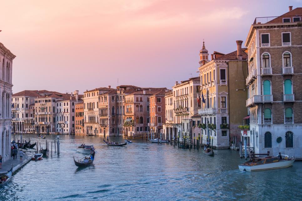 Boats and gondolas on a Venice canal