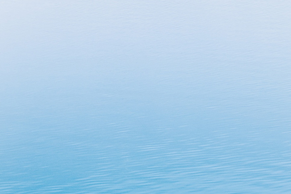 Plain background showing blue water