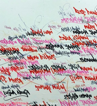 red, pink and black writing