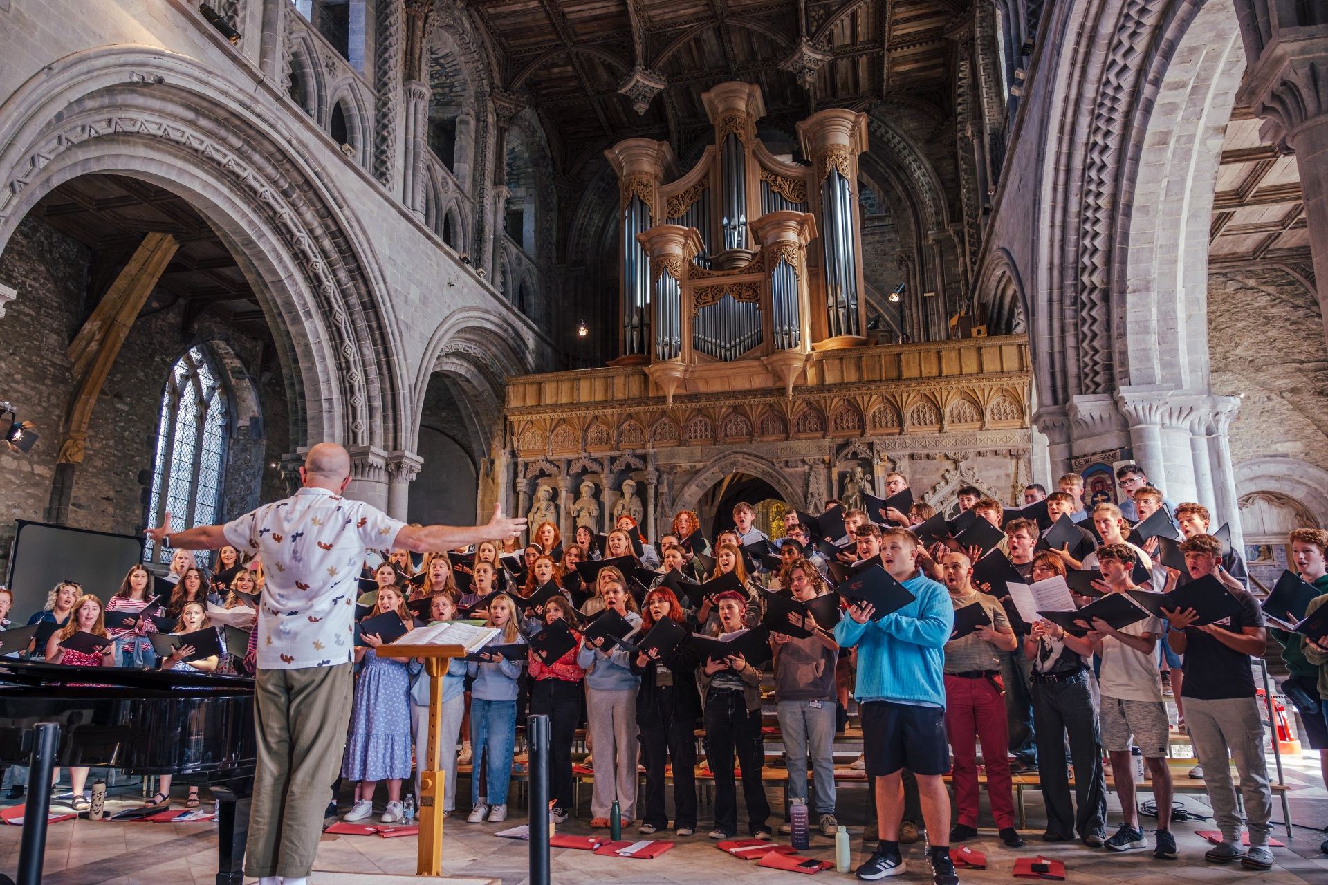 A youth choir singing in St David's Cathedral