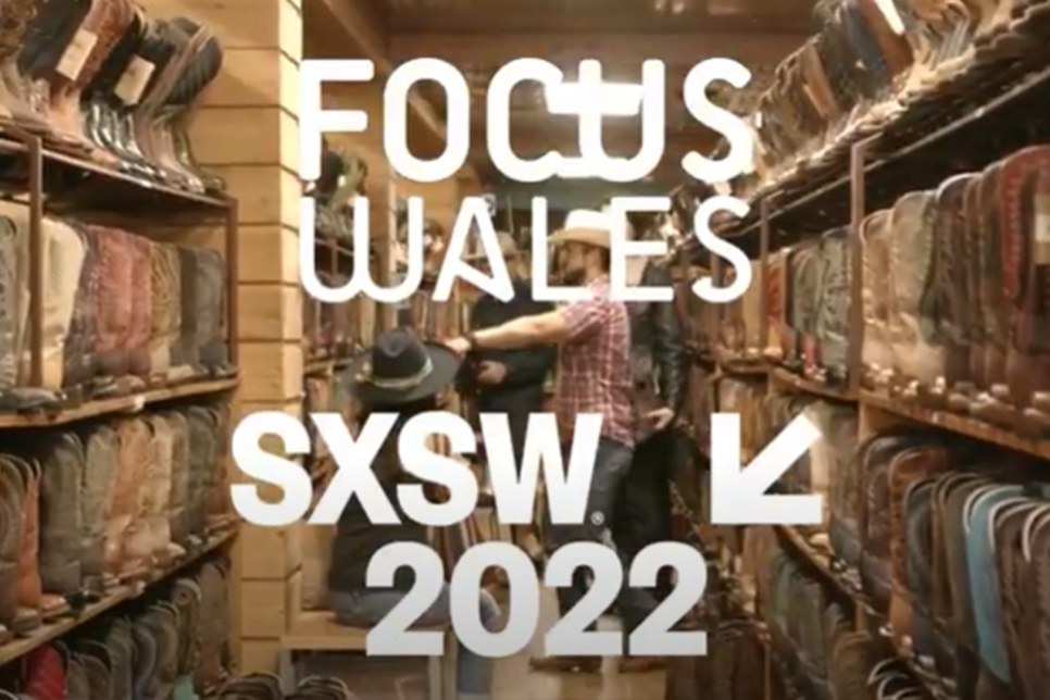 A cowboy boot store in Austin Texas with text overlaying the image reading 'Focus Wales, SXSW 2022'