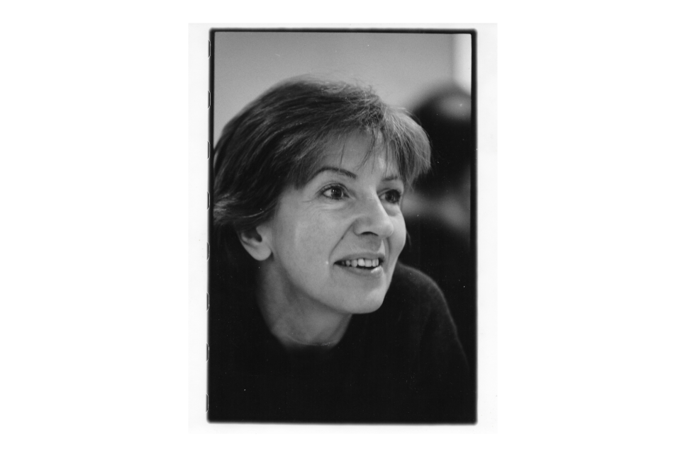 A black and white portrait of a woman
