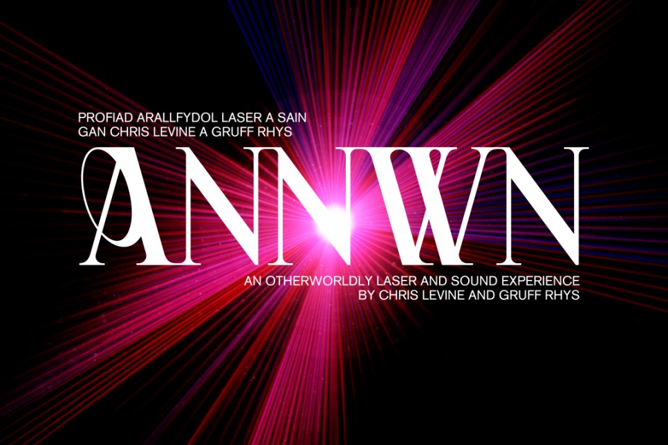 Annwn text with a pink laser behind