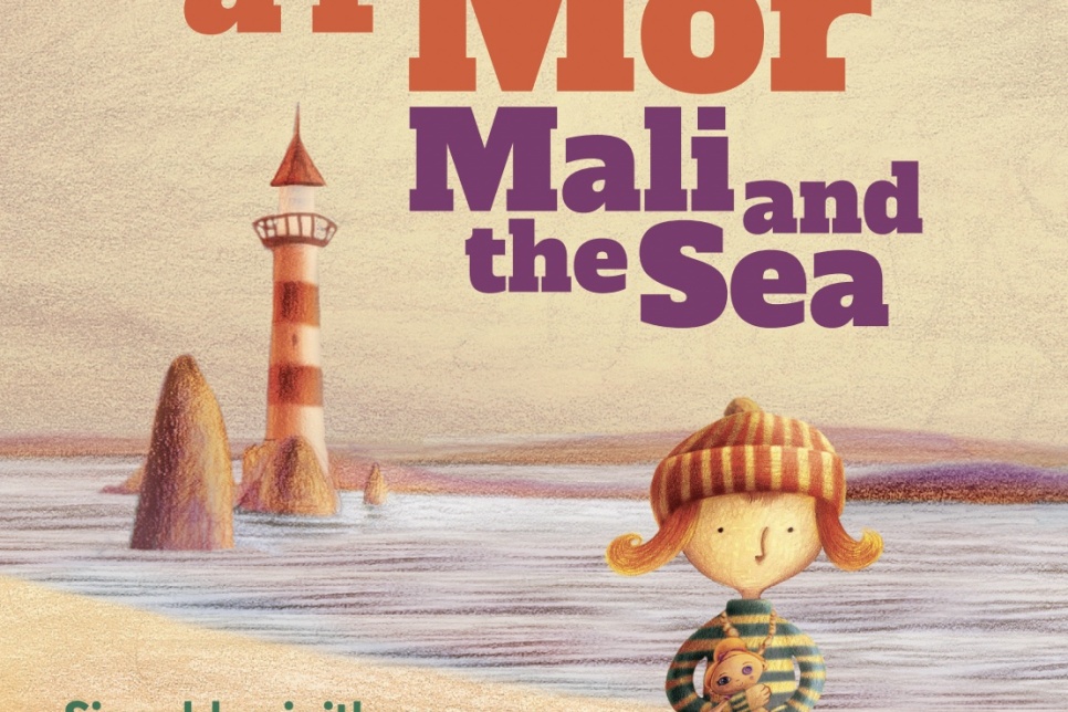 Poster for Mali a'r Môr, showing a lighthouse in the background and a girl holding a doll in the foreground. The text reads: Mali a'r Môr/Mali and the Sea. A bilingual show for little folk/Sioe ddwyieithiog i bobl bach.